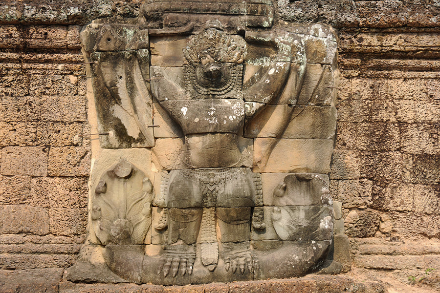 giant Garuda sculpture at the exterior wall of Preah Khan